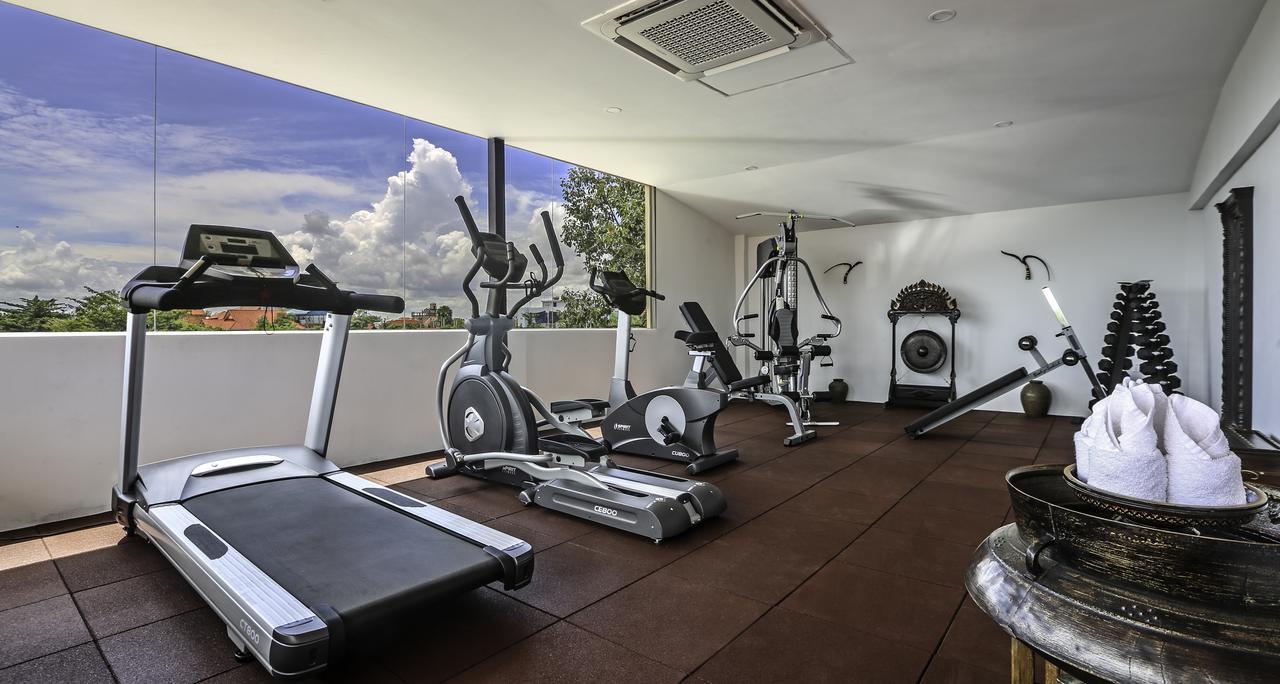 Mane Village Suites Siem Reap Exterior foto A gym in a hotel
